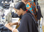 Woman sewing sweatshop-free Woman sewing